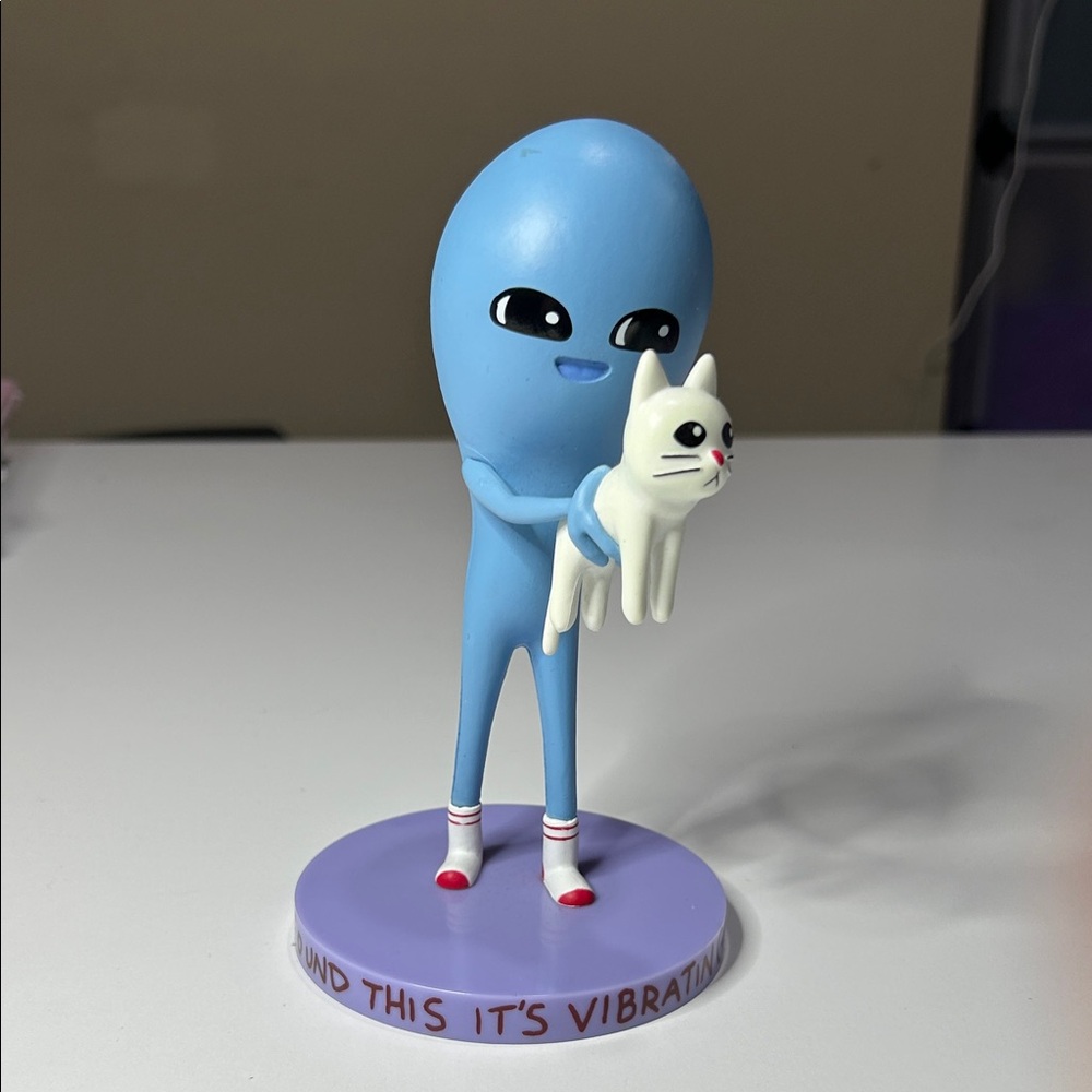 Nathan W. Pyle’s Strange Planet being with Cat